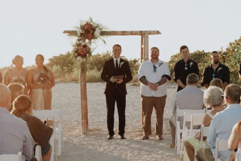 Groom waiting at the alter